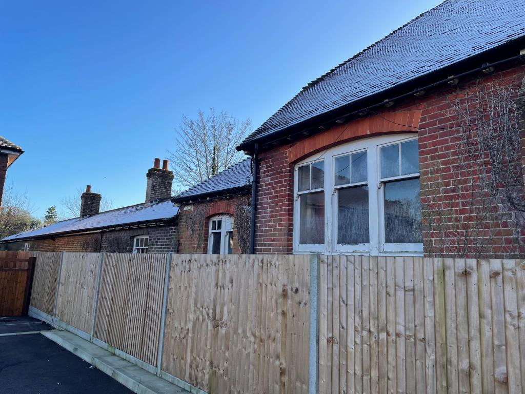 Lot: 134 - FORMER VILLAGE HALL WITH CONSENT FOR CONVERSION INTO SIX RESIDENTIAL DWELLINGS - Side view from Russell Place 2
